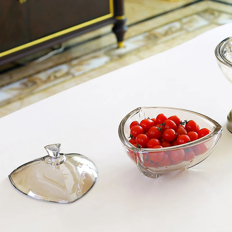 Europe Glass storage tank with lid and foot candy jar Storage box candy dried fruit box Sugar bowl Canister Storage home decorat
Europe Glass storage tank with lid and foot candy jar Storage box candy dried fruit box Sugar bowl Canister Storage home decorat