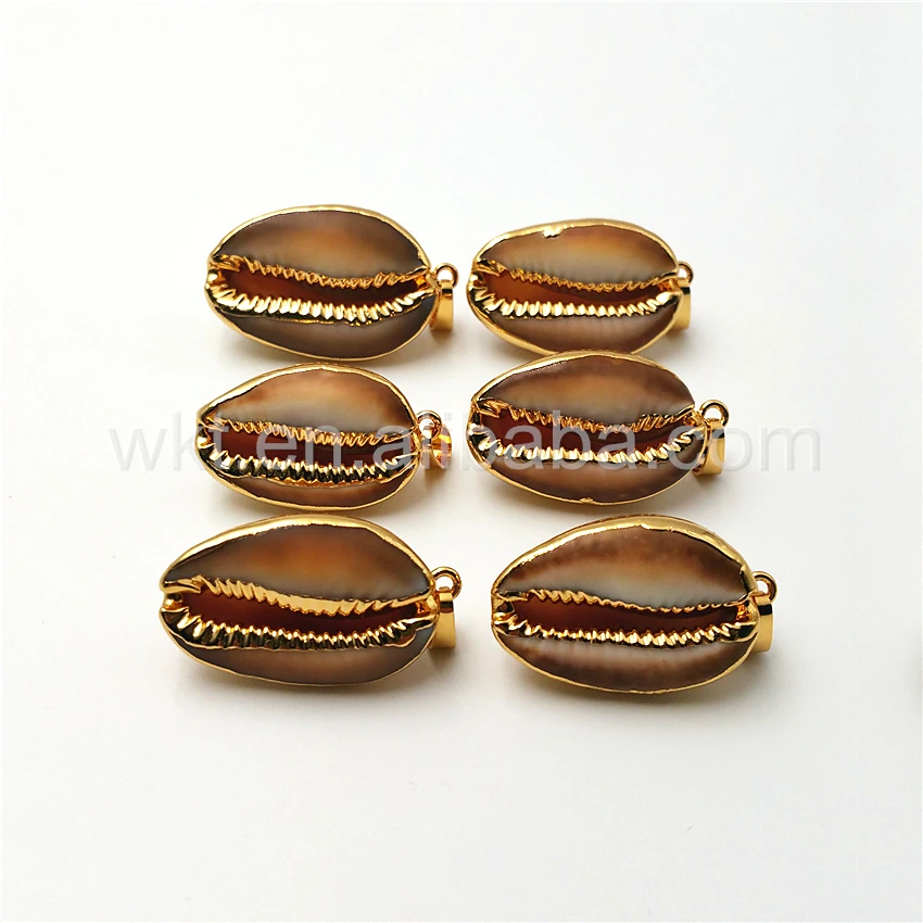 WT-JP020 Wholesale Natural sea zebra cowrie charm pendant 24k gold trim dipped gorgeous sea shell cowrie pendant 25mm
WT-JP020 Wholesale Natural sea zebra cowrie charm pendant 24k gold trim dipped gorgeous sea shell cowrie pendant 25mm