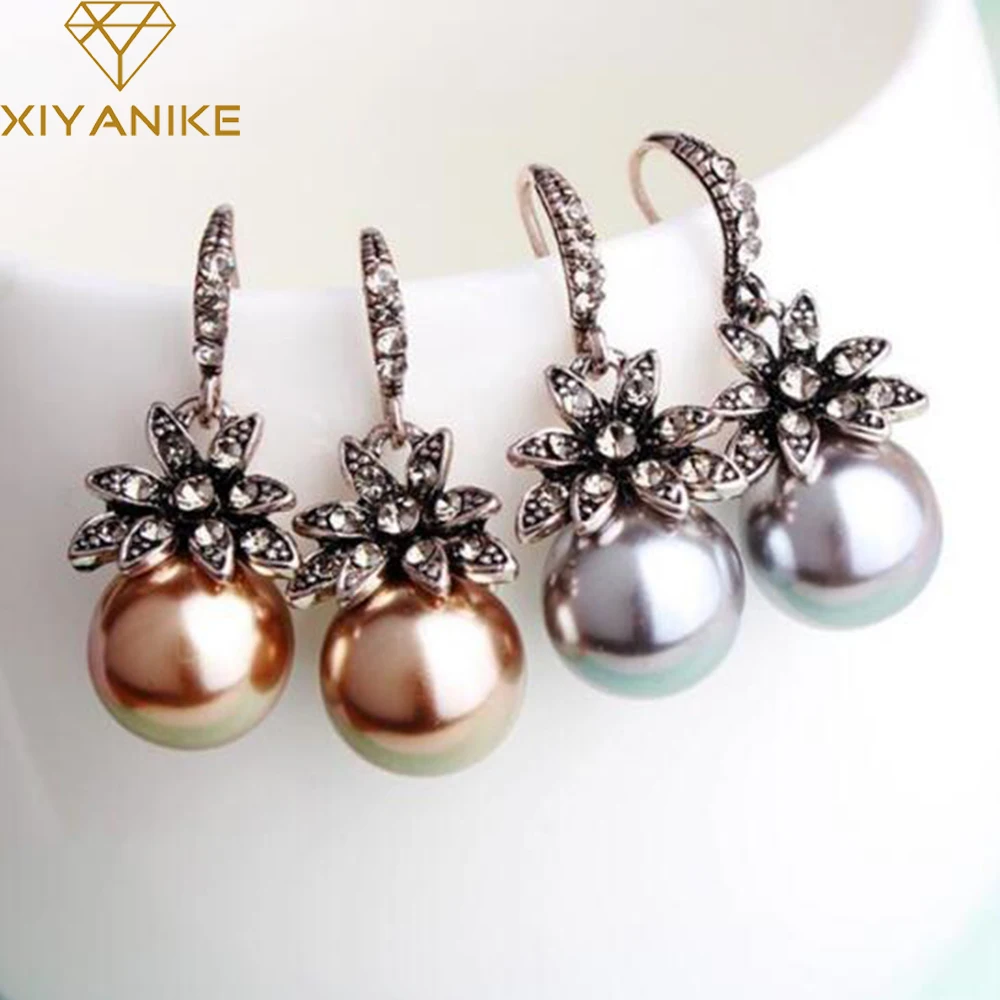New Fashion Luxury Vintage Sun Flower Pearl Drop Earrings For Women Fine Jewelry Accessory Brincos High Quality XY-E144
New Fashion Luxury Vintage Sun Flower Pearl Drop Earrings For Women Fine Jewelry Accessory Brincos High Quality XY-E144