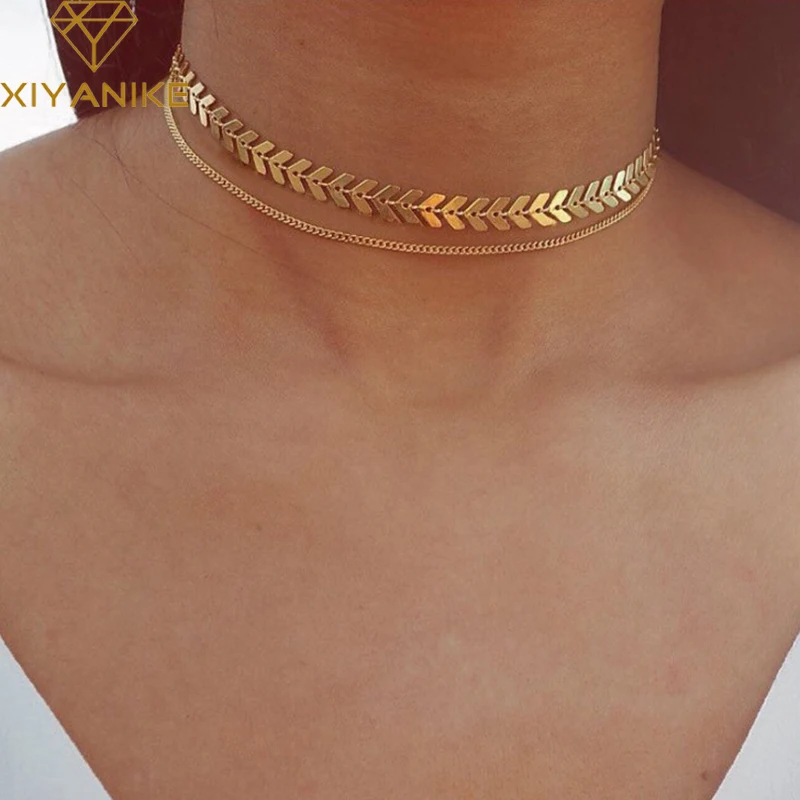 XIYANIKE Bohemian Sequins Fish Bone Chokers Necklace Simple Double Layer Gold Color Necklace For Women Jewelry Accessories N166
XIYANIKE Bohemian Sequins Fish Bone Chokers Necklace Simple Double Layer Gold Color Necklace For Women Jewelry Accessories N166