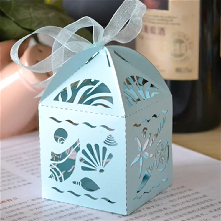 laser cut wedding favor/candy box with free ribbons,sea shell light blue gift box for guests 2021
laser cut wedding favor/candy box with free ribbons,sea shell light blue gift box for guests 2021