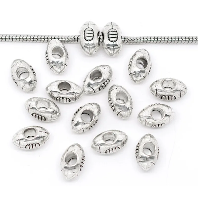 20Pcs Antique Silver Tone American Football Charms European Spacer Beads Fit Snake Chain Jewelry Findings 14x9mm
20Pcs Antique Silver Tone American Football Charms European Spacer Beads Fit Snake Chain Jewelry Findings 14x9mm