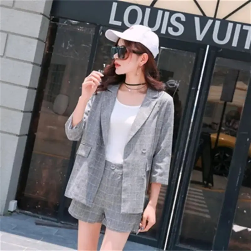 Fashion Plaid suit female New Plaid small suit jacket female short British wind summer shorts two-piece suit women
Fashion Plaid suit female New Plaid small suit jacket female short British wind summer shorts two-piece suit women