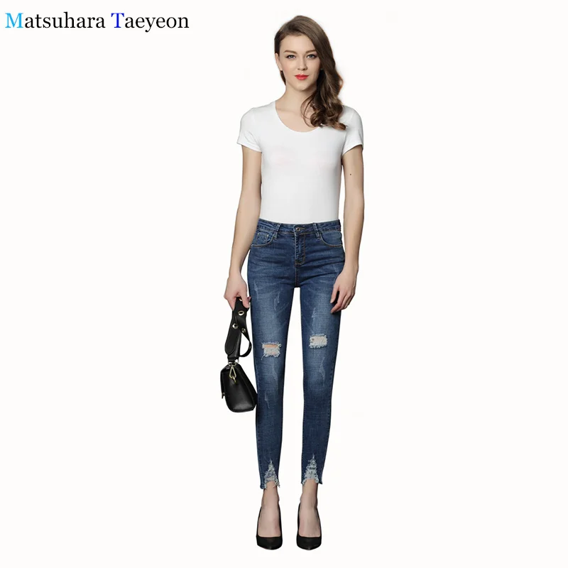 2018 new Fashion stretch jeans woman Ninth pants Scratch worn jeans hole jeans Street trendsetter A woman with pants
2018 new Fashion stretch jeans woman Ninth pants Scratch worn jeans hole jeans Street trendsetter A woman with pants