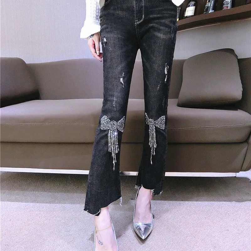 2018 Jeans women Tide brand autumn new sequin bow tassel stretch Slim thin female speaker nine pants Black cowboy Mid waist
2018 Jeans women Tide brand autumn new sequin bow tassel stretch Slim thin female speaker nine pants Black cowboy Mid waist