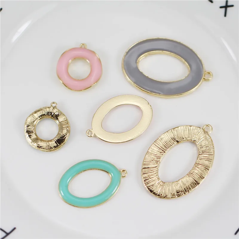 30pcs Creative simple temperament enamel hollow oval pendants Earrings Drop generous circle charm Ear Studs tag DIY
30pcs Creative simple temperament enamel hollow oval pendants Earrings Drop generous circle charm Ear Studs tag DIY