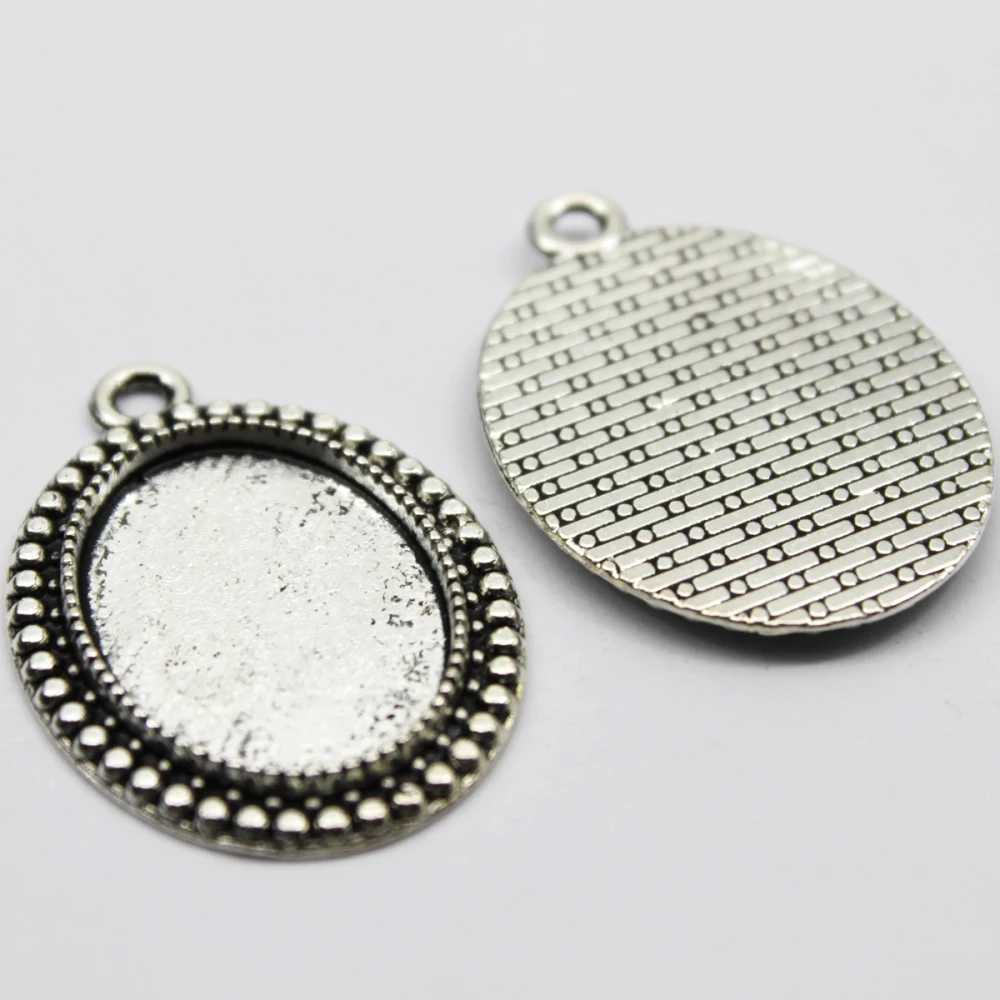 5pcs/lot 18x25mm Necklace Pendant Setting Antique Bronze Silver Color Glass Cabochon Blank Base Supplies for Jewelry Finding
5pcs/lot 18x25mm Necklace Pendant Setting Antique Bronze Silver Color Glass Cabochon Blank Base Supplies for Jewelry Finding