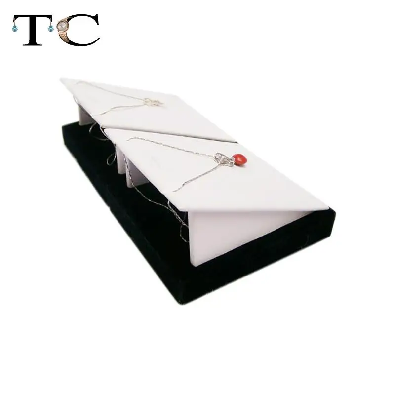 Black-and-white PU pendant frame pendant holder stand separate jewelry props display rack long accessories rack 10pcs/lot
Black-and-white PU pendant frame pendant holder stand separate jewelry props display rack long accessories rack 10pcs/lot