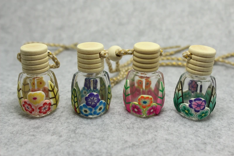 Cute 8ml Small Polymer clay flower glass car hanging perfume glass bottle 10pcs/lot
Cute 8ml Small Polymer clay flower glass car hanging perfume glass bottle 10pcs/lot
