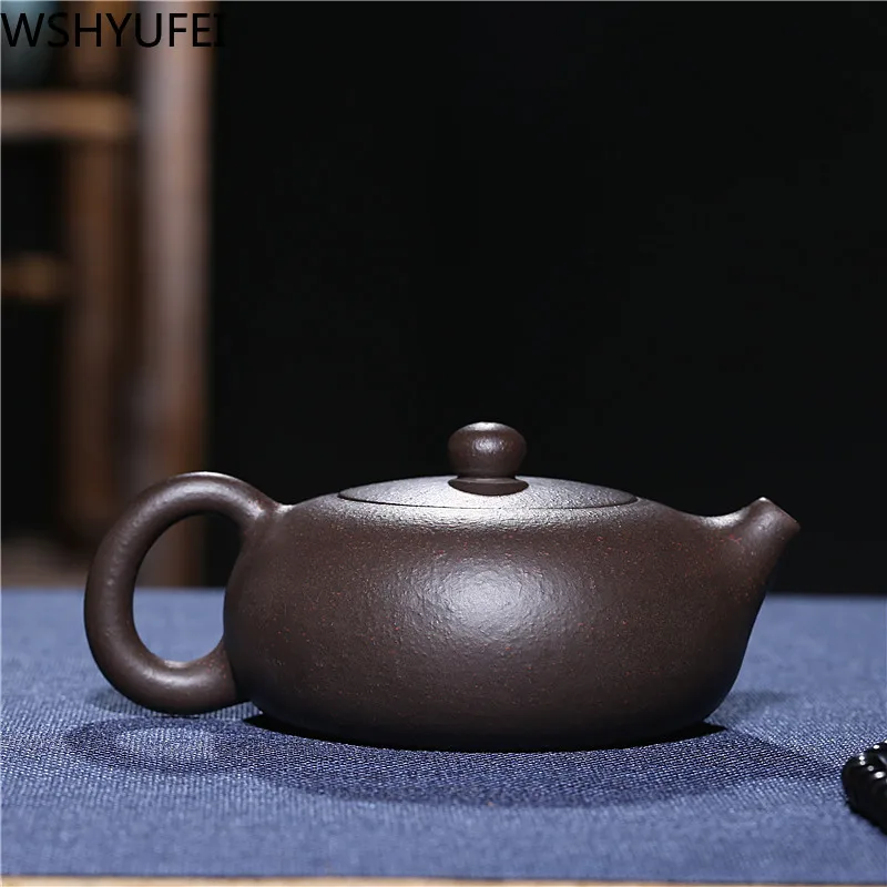 200ml genuine purple sand tea set, mellow color, smooth water, black Zhu mud ball hole flat Xi Shi Kung Fu teapot
200ml genuine purple sand tea set, mellow color, smooth water, black Zhu mud ball hole flat Xi Shi Kung Fu teapot