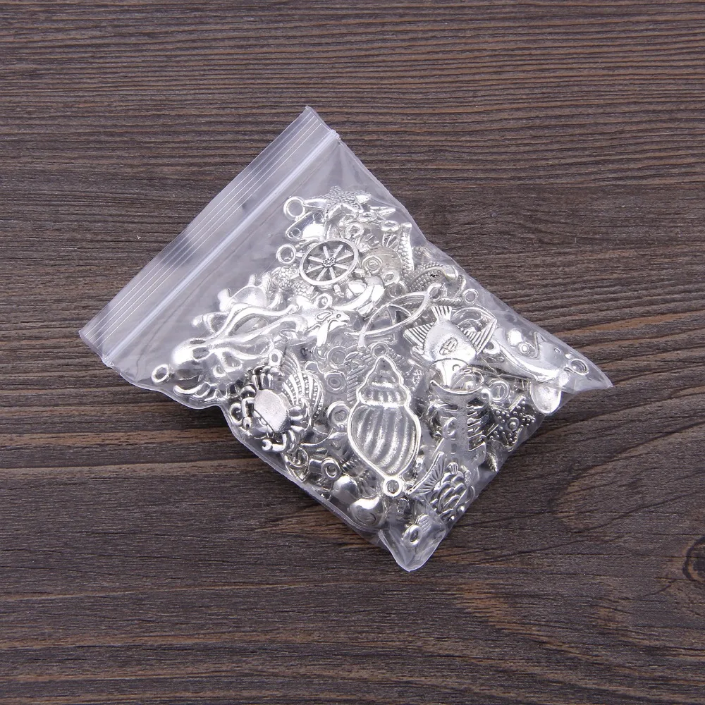 100 pcs Random Mixed Tibetan Silver color Charm fish tortoise Seahorse shell crab charm pendant for Jewelry Making Accessaries
100 pcs Random Mixed Tibetan Silver color Charm fish tortoise Seahorse shell crab charm pendant for Jewelry Making Accessaries