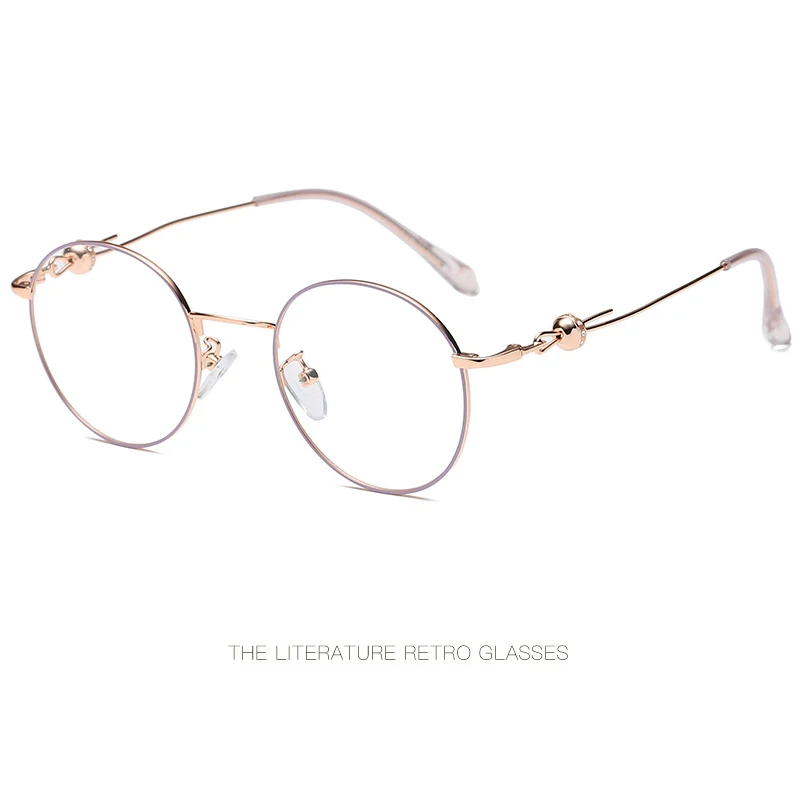 New retro metal glasses frame Literary round frame glasses frame Personality foot silk design trend women's flat mirror.
New retro metal glasses frame Literary round frame glasses frame Personality foot silk design trend women's flat mirror.