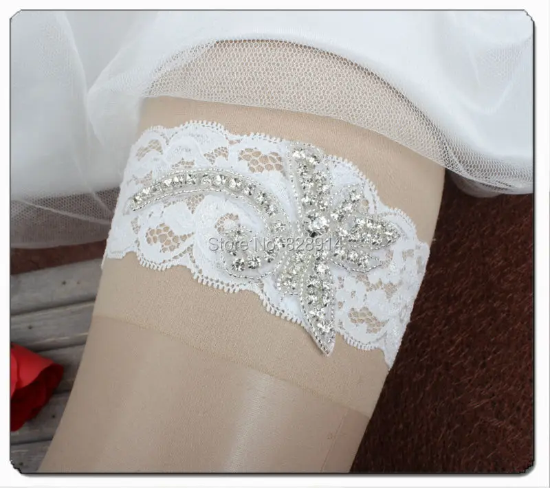 Original Design White Lace Bridal Garter Made of Rhinestoens Beaded Applique and Stretched Lace Trim Handmade
Original Design White Lace Bridal Garter Made of Rhinestoens Beaded Applique and Stretched Lace Trim Handmade