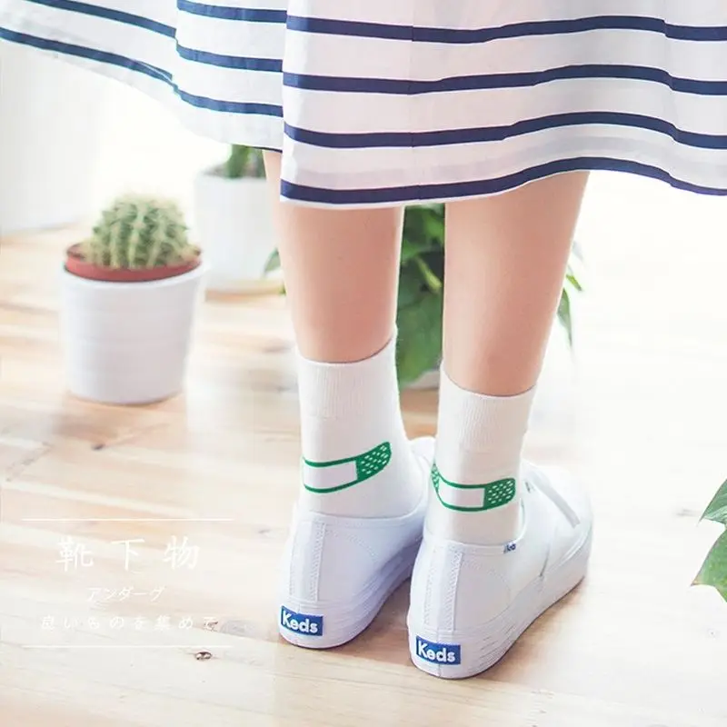 Spring and summer thin section Korean cute band aid calcetines socks white in tube women socks
Spring and summer thin section Korean cute band aid calcetines socks white in tube women socks