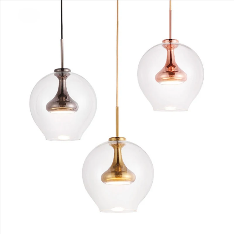 Postmodern minimalist single head clear glass pendant lamp Nordic electroplating iron rose golden restaurant decor LED lighting
Postmodern minimalist single head clear glass pendant lamp Nordic electroplating iron rose golden restaurant decor LED lighting