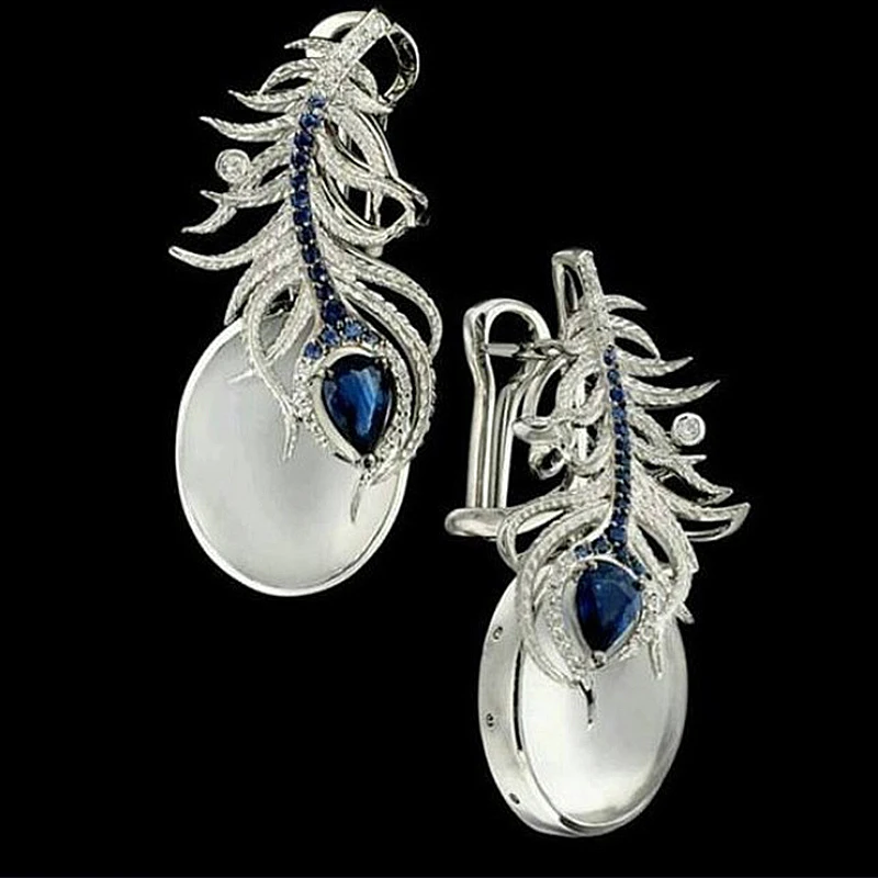 Elegant Silver Plated Feather Drop Earrings Resin Vintage Boho Blue Crystal Ear Cuff Wrap Hook Ethnic Jewelry H4Q887
Elegant Silver Plated Feather Drop Earrings Resin Vintage Boho Blue Crystal Ear Cuff Wrap Hook Ethnic Jewelry H4Q887