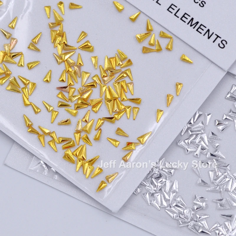 2 packs mixed gold silver flat back 3d metal triangle nail art decorations rhinestones studs nails accessoires arrow head
2 packs mixed gold silver flat back 3d metal triangle nail art decorations rhinestones studs nails accessoires arrow head