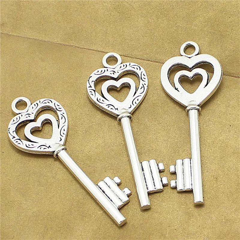 Sweet Bell 15pcs 19*52mm Antique Metal Zinc Alloy Trendy key shaped charm Lovely Hearts Keys Jewelry Charms Pendant D1096
Sweet Bell 15pcs 19*52mm Antique Metal Zinc Alloy Trendy key shaped charm Lovely Hearts Keys Jewelry Charms Pendant D1096