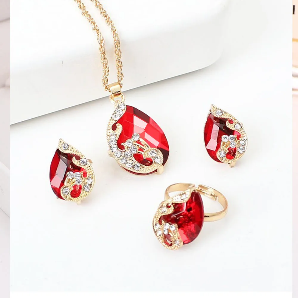 Colors Crystal Pendant New Water Drop peacock Earrings Ring Set Elegant Jewelry Set Women Valentine Wedding Party Sets
Colors Crystal Pendant New Water Drop peacock Earrings Ring Set Elegant Jewelry Set Women Valentine Wedding Party Sets