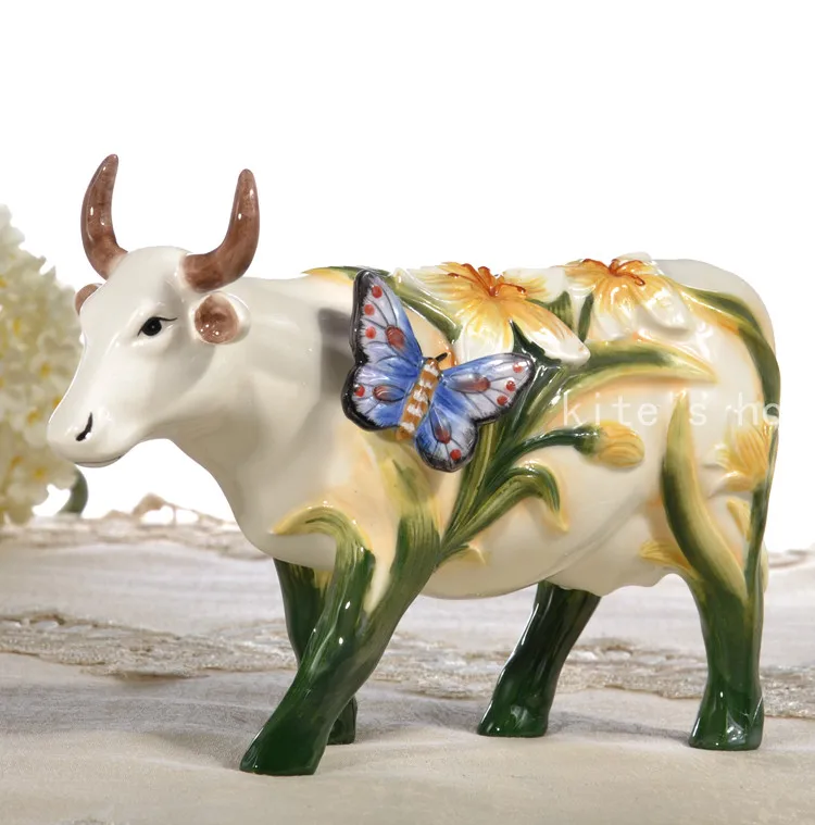 butterfly Ceramic creative cow Bull home decor crafts room decoration handicraft Cattle porcelain wedding decoration figurine
butterfly Ceramic creative cow Bull home decor crafts room decoration handicraft Cattle porcelain wedding decoration figurine