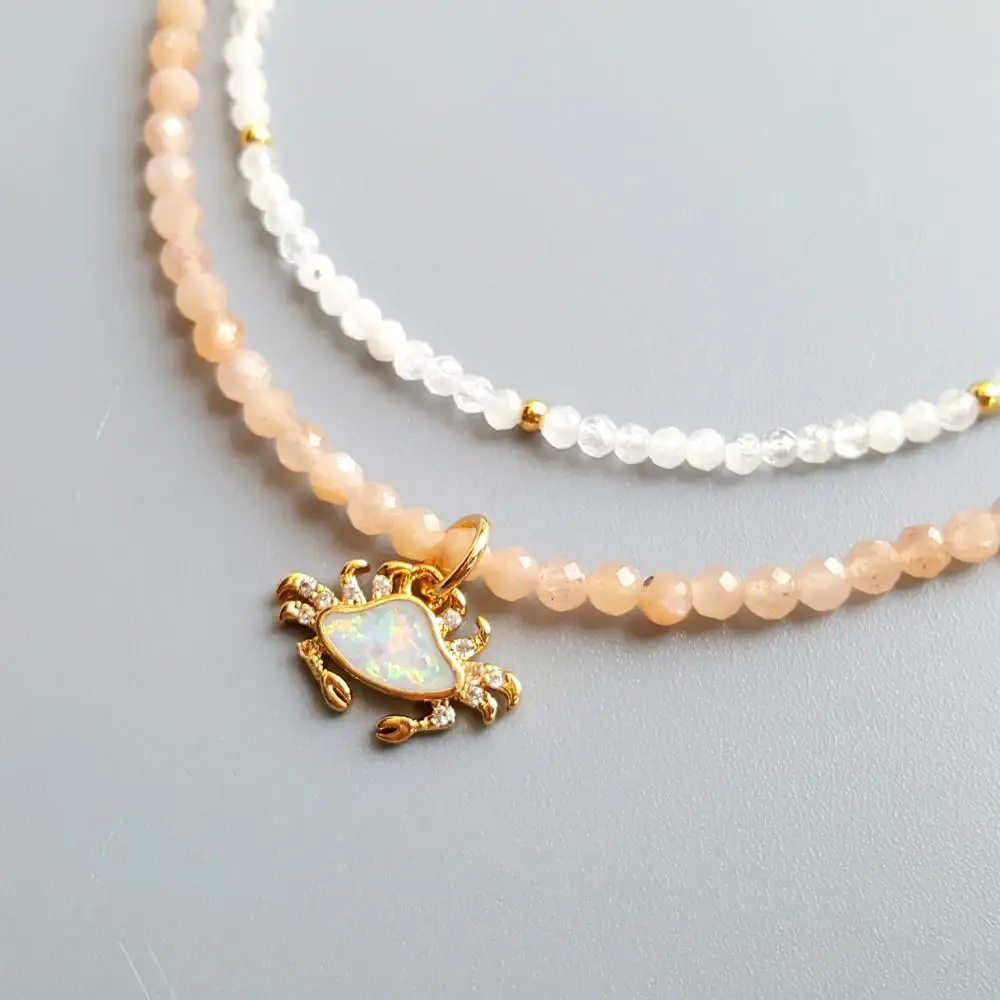 Lii Ji Genuine Moonstone Sunstone Lab-Created Opal Crab Pendant Charms 2 Rows Delicated Handmade Necklace
Lii Ji Genuine Moonstone Sunstone Lab-Created Opal Crab Pendant Charms 2 Rows Delicated Handmade Necklace