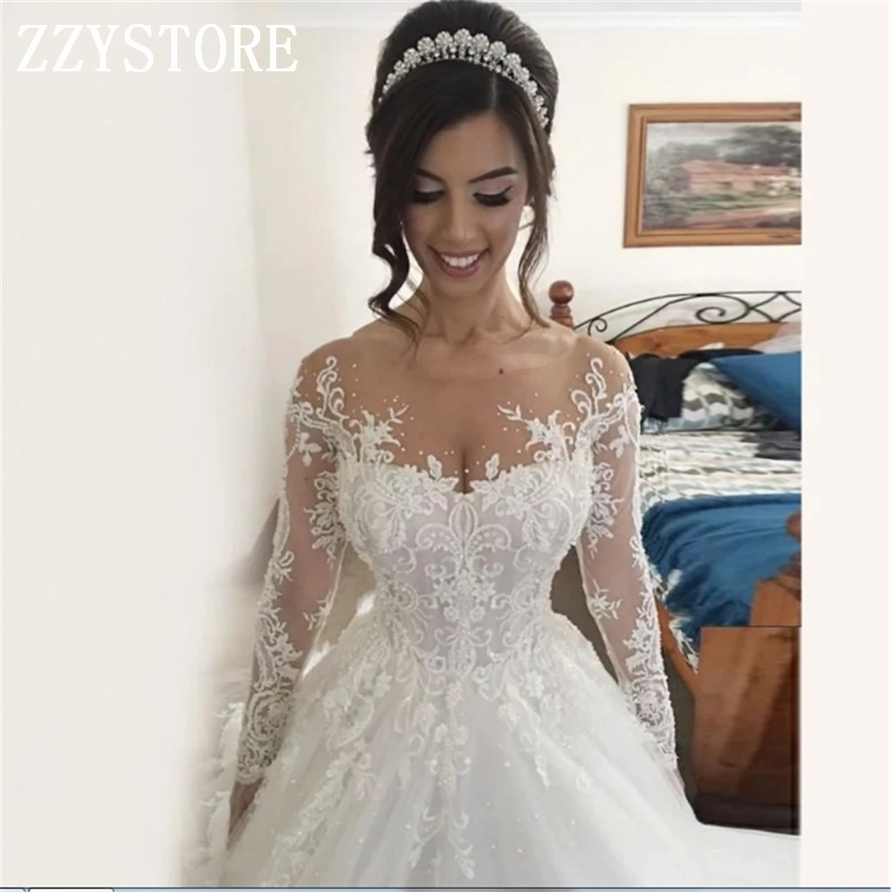 Soft Tulle HIGH Quality Illusion Appliques Arabic White wedding dressesn Chapel Train Full Sleeves Brides Dresses 2023
Soft Tulle HIGH Quality Illusion Appliques Arabic White wedding dressesn Chapel Train Full Sleeves Brides Dresses 2023