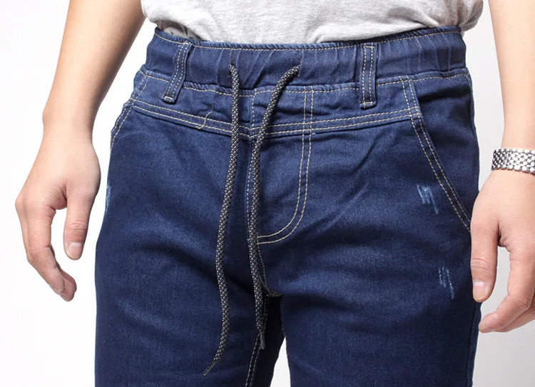 2018 Men's Harem Jeans Washed Feet Shinny Denim Black Pant Hip Hop Sportswear Elastic Waist Joggers Pants Plus Size 4XL
2018 Men's Harem Jeans Washed Feet Shinny Denim Black Pant Hip Hop Sportswear Elastic Waist Joggers Pants Plus Size 4XL