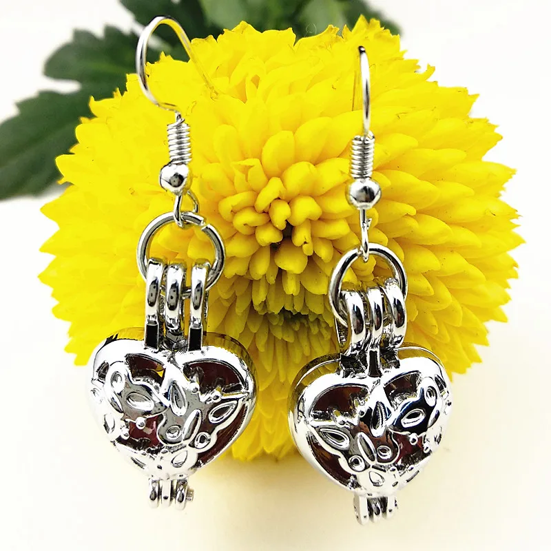 1pais Heart Angel, Mermaid Ethnic style Dangle Earrings Bead Perfume Essential Oil Diffuser Cage Locket Drop Earring for women
1pais Heart Angel, Mermaid Ethnic style Dangle Earrings Bead Perfume Essential Oil Diffuser Cage Locket Drop Earring for women