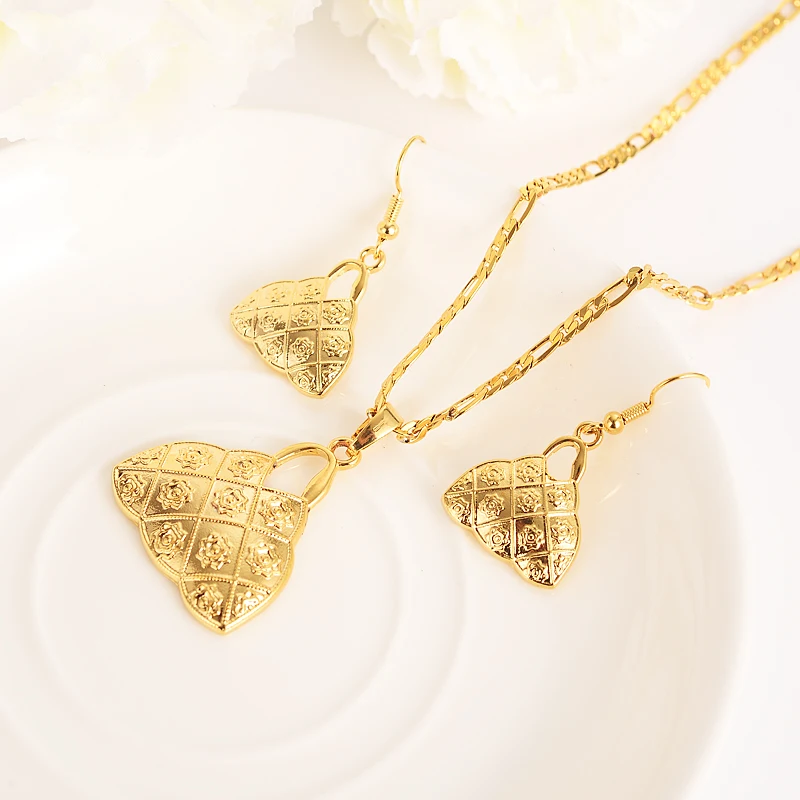 handmade Pendan Necklaces Earrings Gold bag blium Jewellery Set Papua New Guinea Wedding party women girls gifts
handmade Pendan Necklaces Earrings Gold bag blium Jewellery Set Papua New Guinea Wedding party women girls gifts