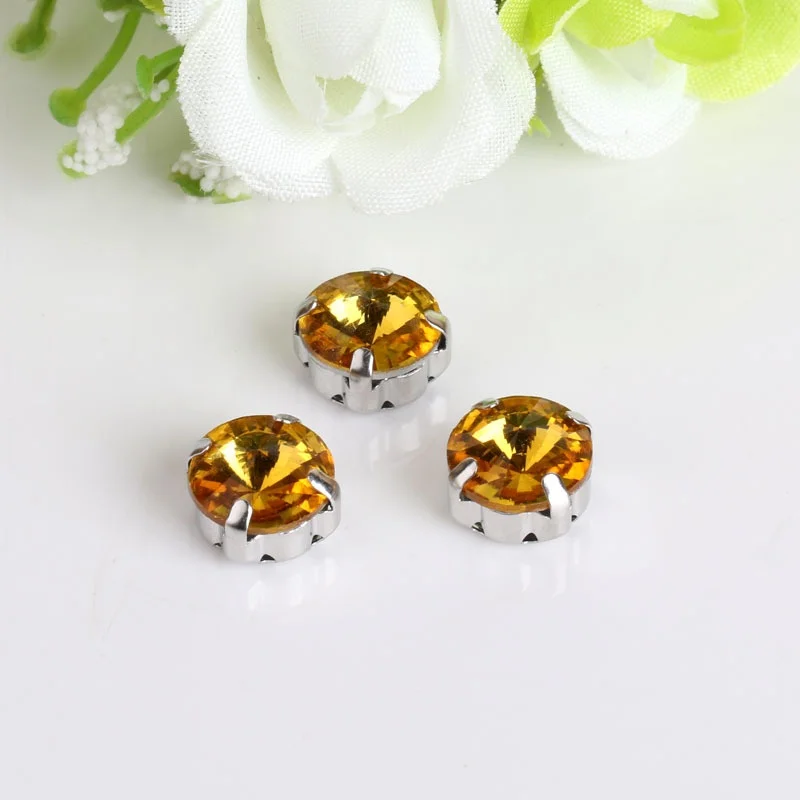 16mm 200pcs/pack round shape sew on rhinestones high-quality Crystal glass with silvery claw DIY fashion accessoriesYJ06
16mm 200pcs/pack round shape sew on rhinestones high-quality Crystal glass with silvery claw DIY fashion accessoriesYJ06