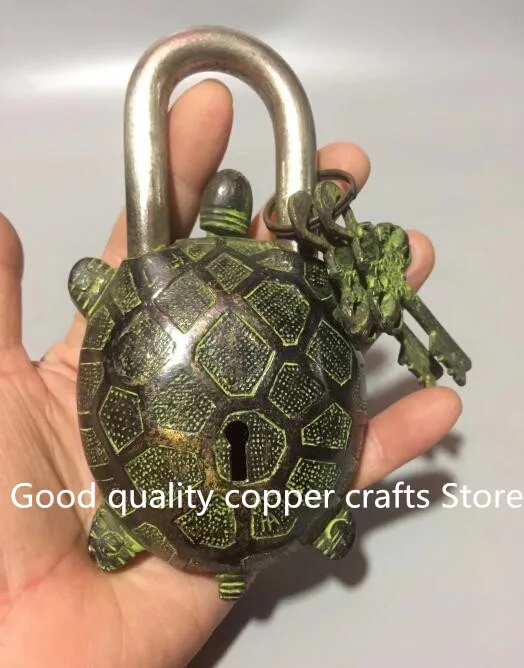 Бронзовая статуэтка черепаха с замком 
Бронзовая статуэтка черепаха с замком