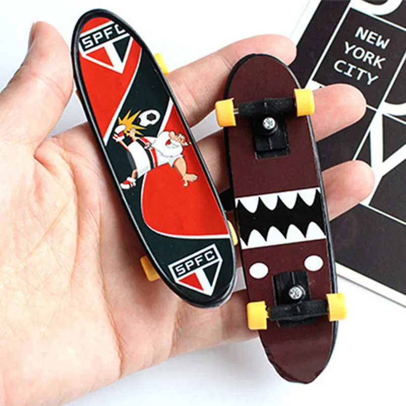 2 Pcs/set Plastic Mini Skate Finger Skateboarding Fingerboard Classic Game Toys For Boys Skateboard Finger Board Random Color
2 Pcs/set Plastic Mini Skate Finger Skateboarding Fingerboard Classic Game Toys For Boys Skateboard Finger Board Random Color