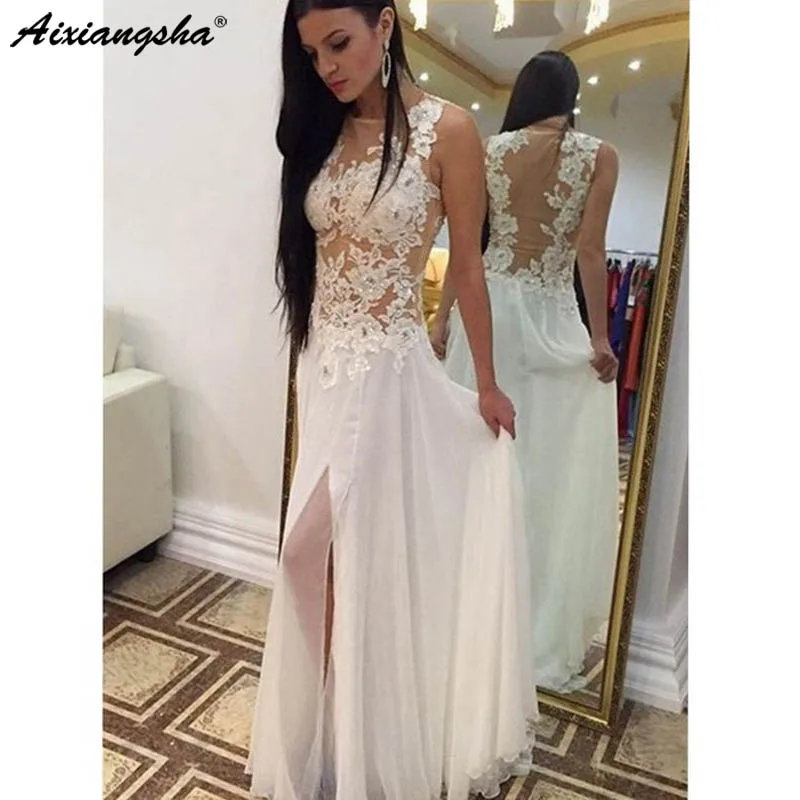 White Evening Dresses New Arrival Front Split SheerTulle Appliques Beading Long Chiffon Evening Gowns robe de soiree
White Evening Dresses New Arrival Front Split SheerTulle Appliques Beading Long Chiffon Evening Gowns robe de soiree