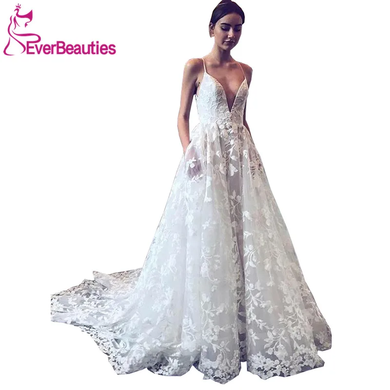 Vestidos De Novia Lace Wedding Dress with Pockets 2020 V-Neck Beach Bride Dress Spaghetti Straps Wedding Gowns Robe De Mariee
Vestidos De Novia Lace Wedding Dress with Pockets 2020 V-Neck Beach Bride Dress Spaghetti Straps Wedding Gowns Robe De Mariee