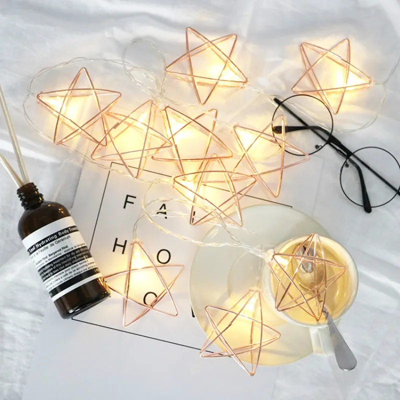 10/20LED waterproof battery rose gold five-pointed star string light wrought iron hollow room decoration geometric modeling
10/20LED waterproof battery rose gold five-pointed star string light wrought iron hollow room decoration geometric modeling