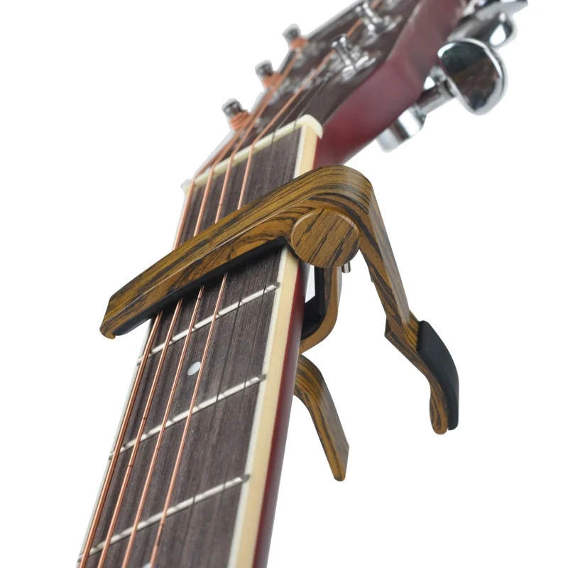 Null Wood Guitar Adjustment Clip Brand New MA-12 Capo 6-String Acoustic Guitar Capo Zinc Alloy for Acoustic Electric Guitars 4 C
Null Wood Guitar Adjustment Clip Brand New MA-12 Capo 6-String Acoustic Guitar Capo Zinc Alloy for Acoustic Electric Guitars 4 C