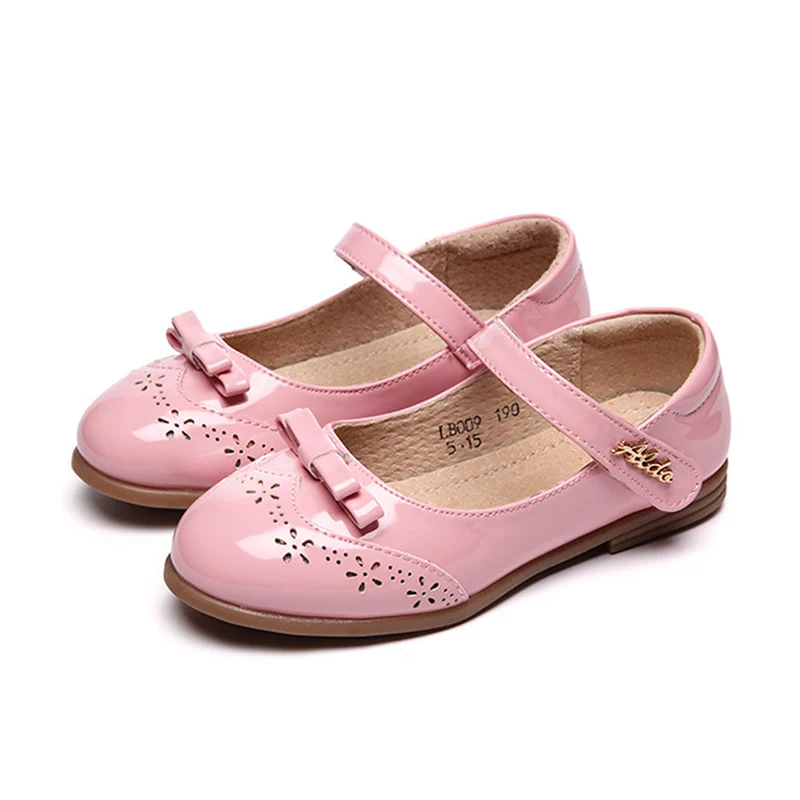Girls pink party wedding shoes princess shoes patent leather bow pierced carved children's shoes
Girls pink party wedding shoes princess shoes patent leather bow pierced carved children's shoes