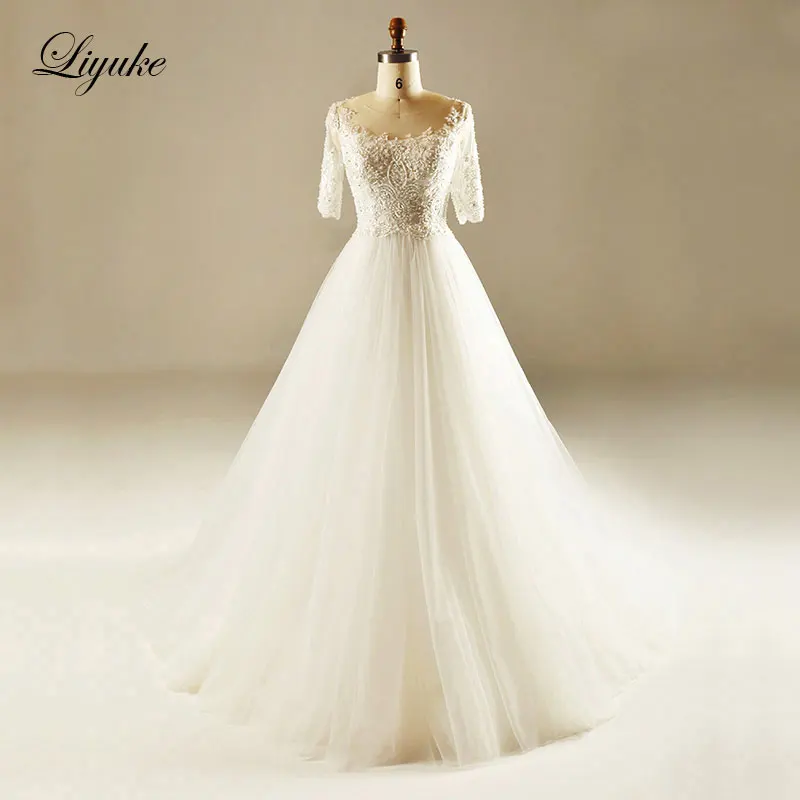 Liyuke Luxury Elegant Satin Scalloped A-Line Wedding Dress Beading New Arrival Bridal Dress Custom Made
Liyuke Luxury Elegant Satin Scalloped A-Line Wedding Dress Beading New Arrival Bridal Dress Custom Made