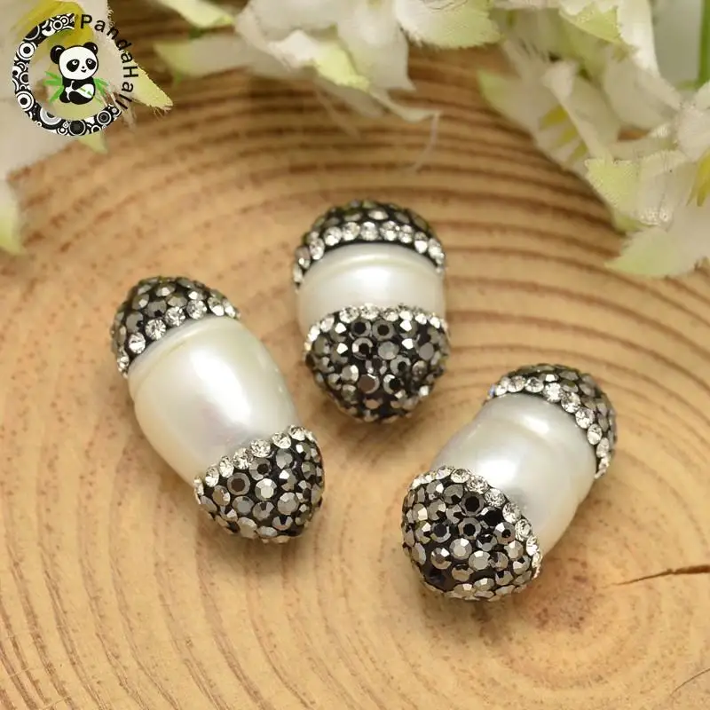 Oval Shell Pearl Beads, with Polymer Clay Rhinestones, White, 16~22x10.5~12mm, Hole: 1mm F60
Oval Shell Pearl Beads, with Polymer Clay Rhinestones, White, 16~22x10.5~12mm, Hole: 1mm F60