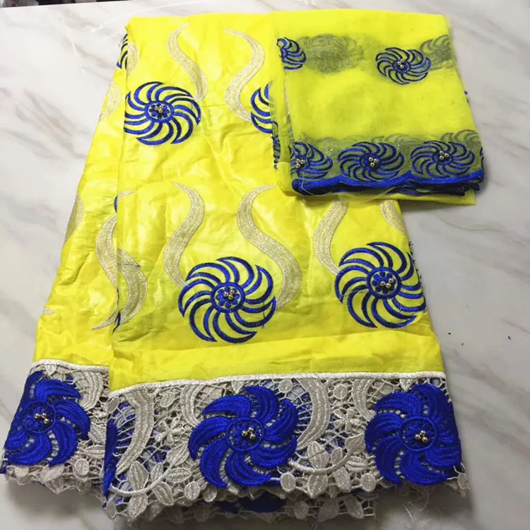 5Yards Beautiful yellow african Bazin brocade lace fabric and 2Yards blue flower french net lace embroidery for dress BZ6-1
5Yards Beautiful yellow african Bazin brocade lace fabric and 2Yards blue flower french net lace embroidery for dress BZ6-1