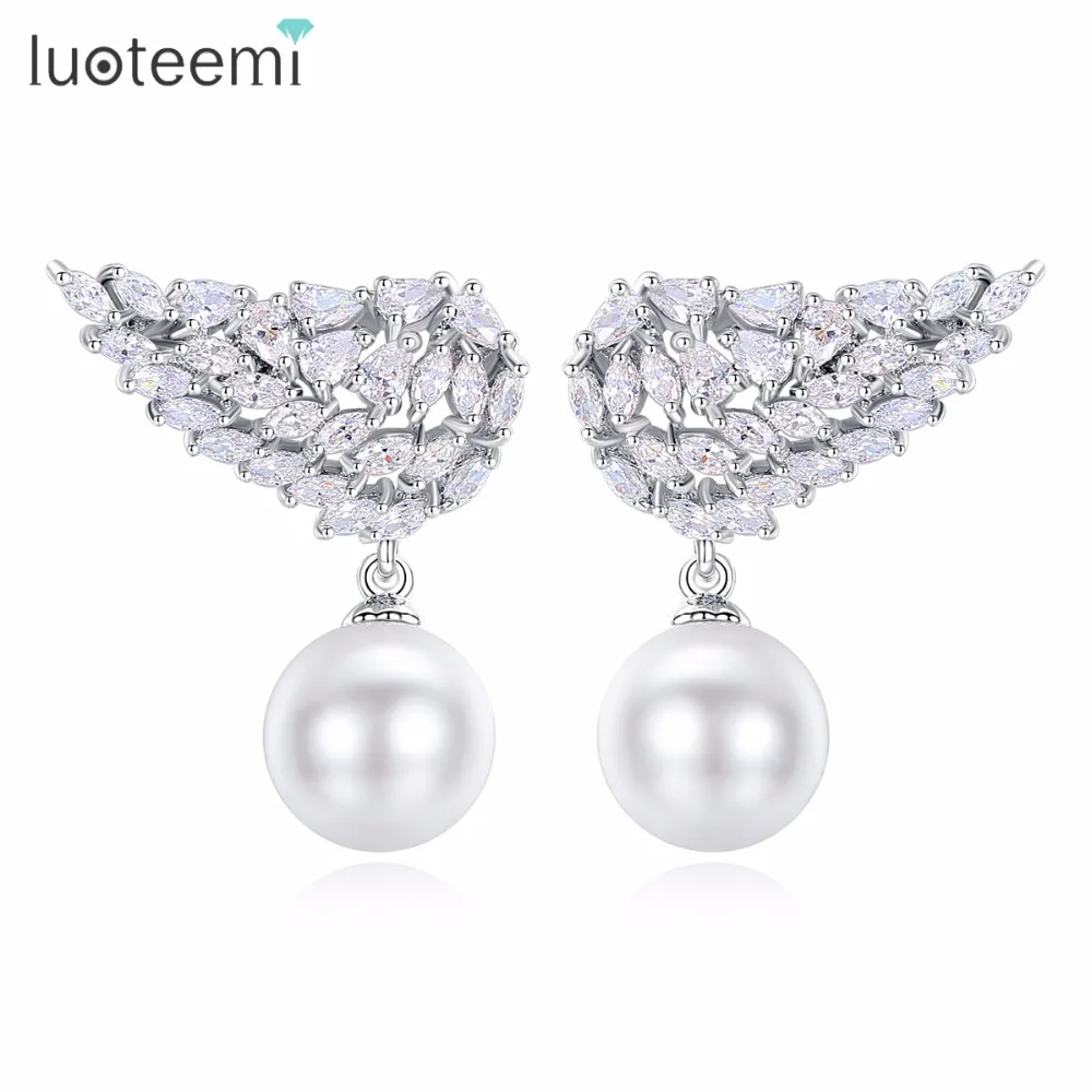 LUOTEEMI Brand Noble New Fashion Double Feather Clear Imitation Pearl Star Stud Earrings Brincos for Girl Gift Party Bijoux
LUOTEEMI Brand Noble New Fashion Double Feather Clear Imitation Pearl Star Stud Earrings Brincos for Girl Gift Party Bijoux