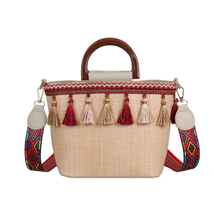 European and American style new tassel hit color grass woven bag female bag shoulder bag large capacity holiday beach bag
European and American style new tassel hit color grass woven bag female bag shoulder bag large capacity holiday beach bag