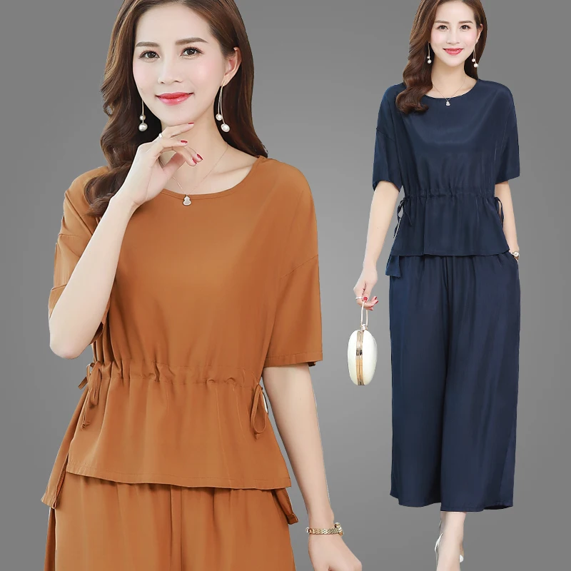 Middle-aged Women's 2 piece set Summer Suit Fashion Casual Short-sleeved Tops+Wide leg pants Large size Ladies Clothing Sets 5XL
Middle-aged Women's 2 piece set Summer Suit Fashion Casual Short-sleeved Tops+Wide leg pants Large size Ladies Clothing Sets 5XL