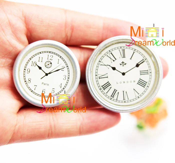 G05-X4347 детский подарок игрушка 1:12 кукольный домик Мини Мебель Миниатюрные rement серебряные часы 2 шт./компл.
G05-X4347 детский подарок игрушка 1:12 кукольный домик Мини Мебель Миниатюрные rement серебряные часы 2 шт./компл.