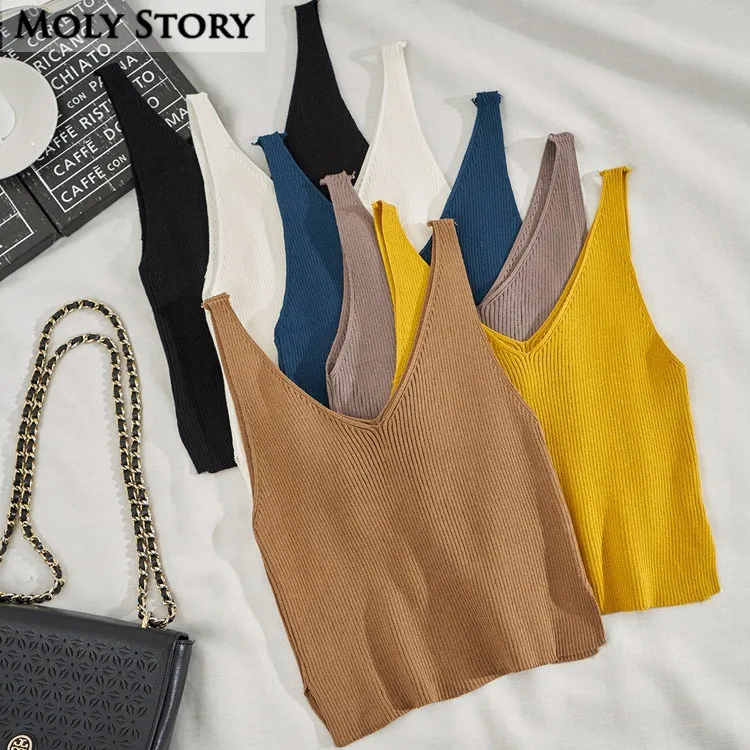 Женский трикотажный топ без рукавов, вязаный кроп-топ с треугольным вырезом на лето
Женский трикотажный топ без рукавов, вязаный кроп-топ с треугольным вырезом на лето