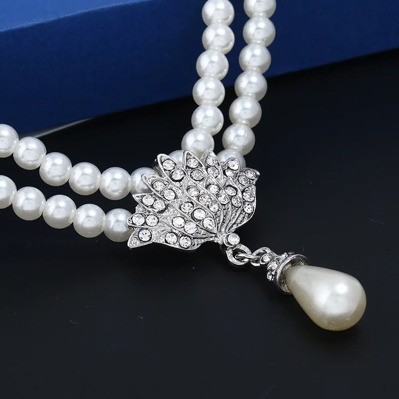 Romantic Wedding Necklace Sets for Women Water Drop Simulated Pearl Phoenix Rhinestone Necklace and Earing Party Jewelry Set
Romantic Wedding Necklace Sets for Women Water Drop Simulated Pearl Phoenix Rhinestone Necklace and Earing Party Jewelry Set