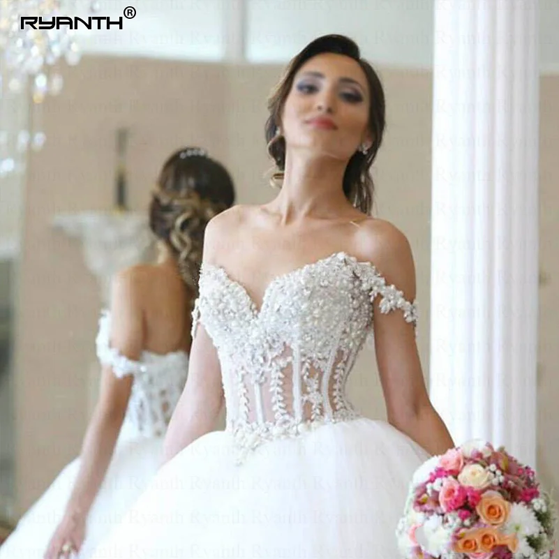 Ryanth Princess Wedding Dress Gown Vestido De Noiva Dubai Arabic Sweetheart Pearl Beaded Illusion Tulle Corset Bride Gowns
Ryanth Princess Wedding Dress Gown Vestido De Noiva Dubai Arabic Sweetheart Pearl Beaded Illusion Tulle Corset Bride Gowns