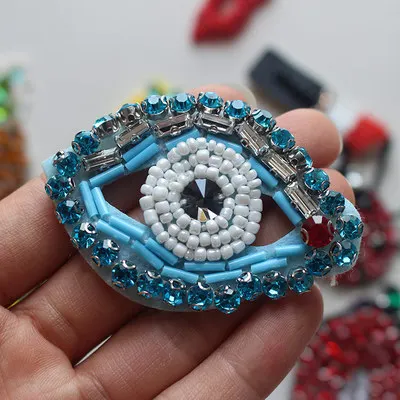 Handmade bead blue eye sequins Rhinestones brooch patch vintage embroidered fabric applique clothing decoration sew on patch
Handmade bead blue eye sequins Rhinestones brooch patch vintage embroidered fabric applique clothing decoration sew on patch