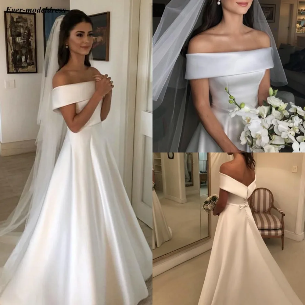 Elegant Off Shoulder Wedding Dresses Plus Size 2021 Bridal Gowns Court Train Satin Button Bow Customized Robe De Mariee
Elegant Off Shoulder Wedding Dresses Plus Size 2021 Bridal Gowns Court Train Satin Button Bow Customized Robe De Mariee
