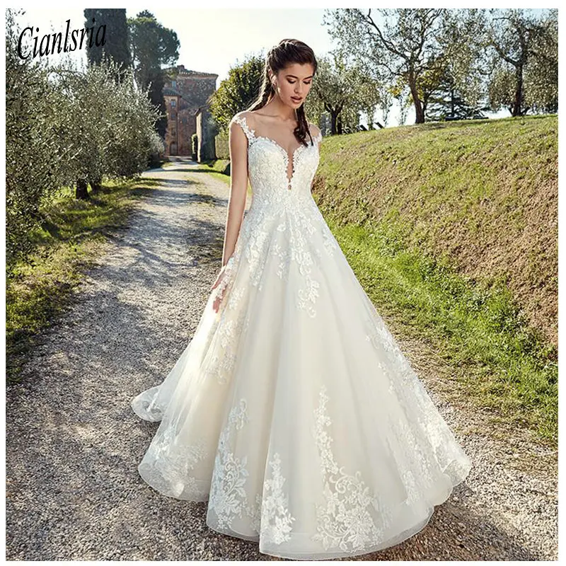 2020 Ivory Elegant Appliqued Informal Wedding Dresses A Line Train Illusion Sleeveless Bride Dresses Custom Made
2020 Ivory Elegant Appliqued Informal Wedding Dresses A Line Train Illusion Sleeveless Bride Dresses Custom Made